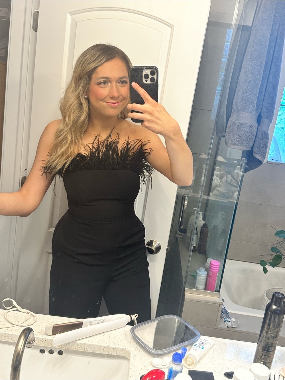 Black Jumpsuit with Feathers on Top
